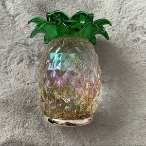Pineapple candle holder. Brand new. Lights up beautifully with glitter inside!!
